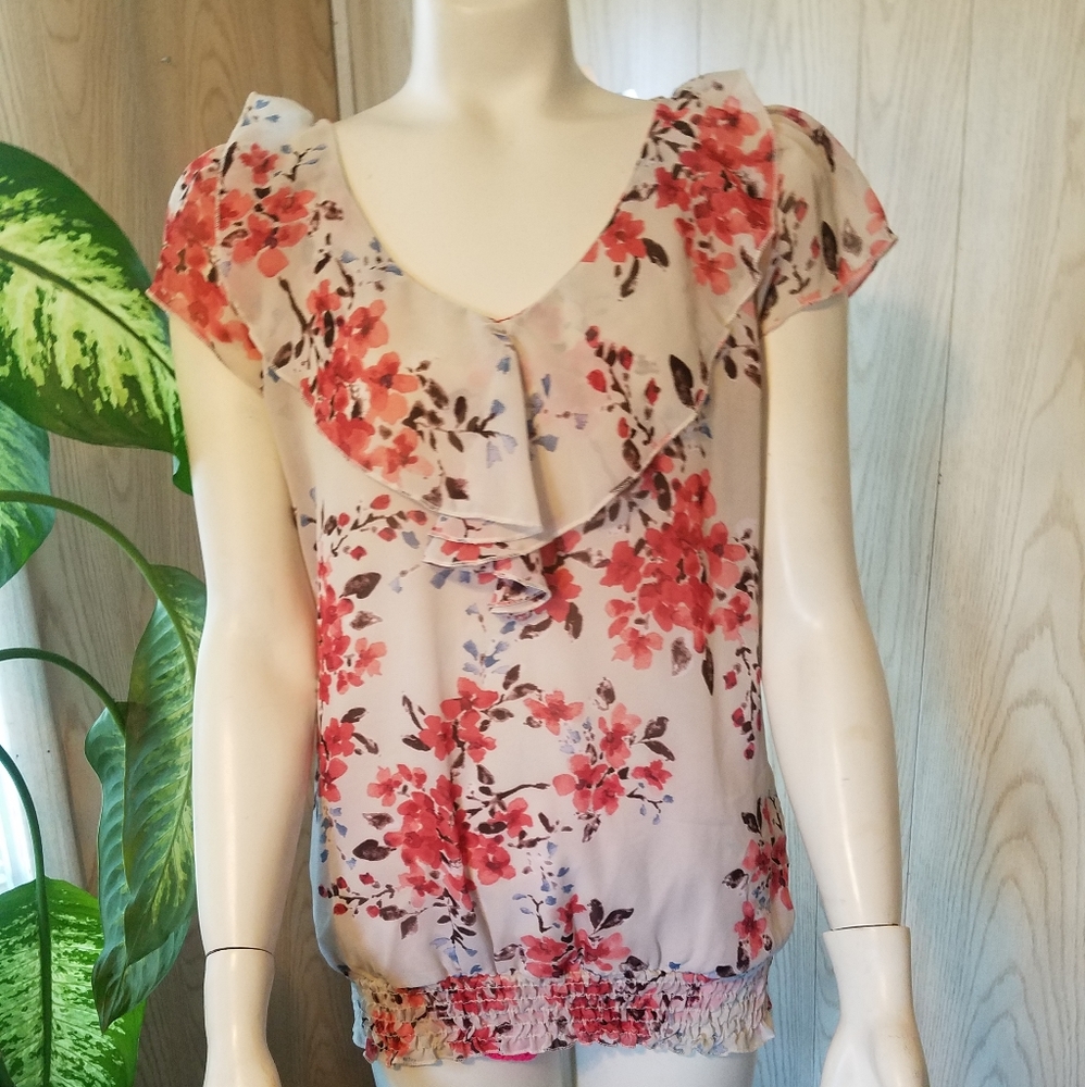 Tan flowered shirt